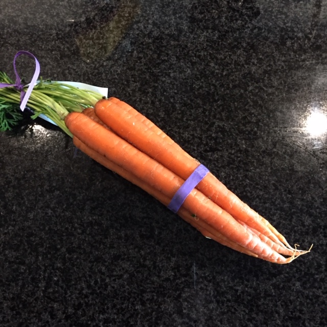Carrots with a purple rubber band
